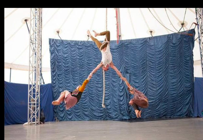 Circus group performance in a tent